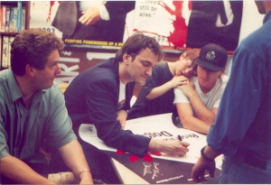 Tarantino, Tim Roth and Chris Penn signing Reservoir Dogs posters. Photo (c)Todd Mecklem